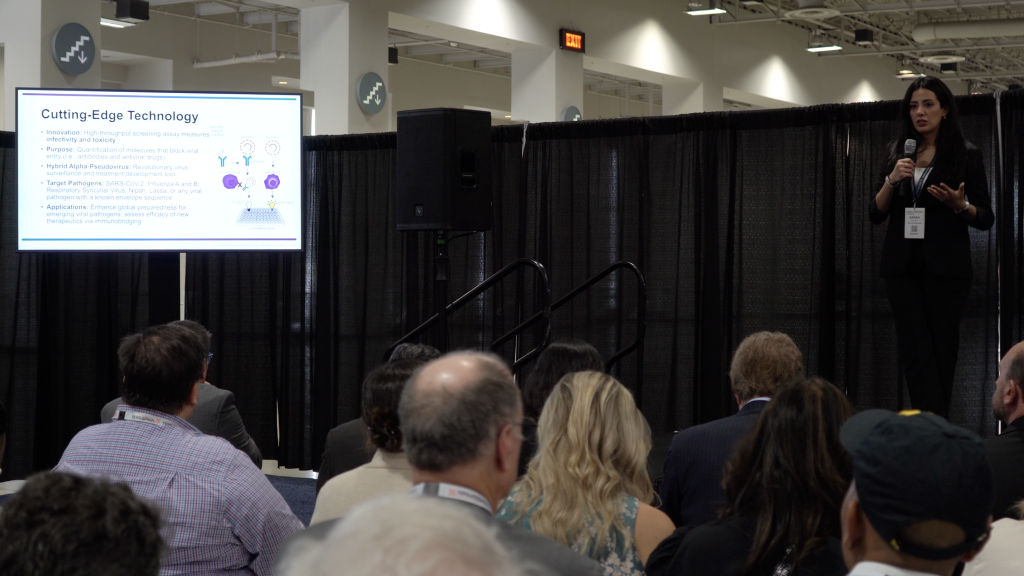 Scientist on stage presenting